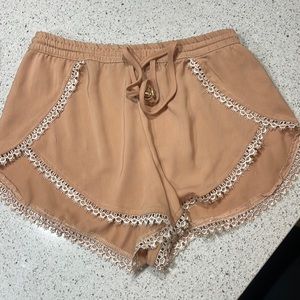 Dusty pink short shorts.